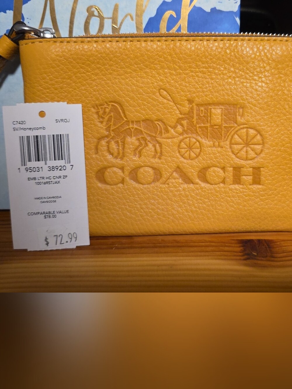 COACH  Yellow/ BURNTORANGE Pebbled Leather Wristlet with Embossed Coach Logo
